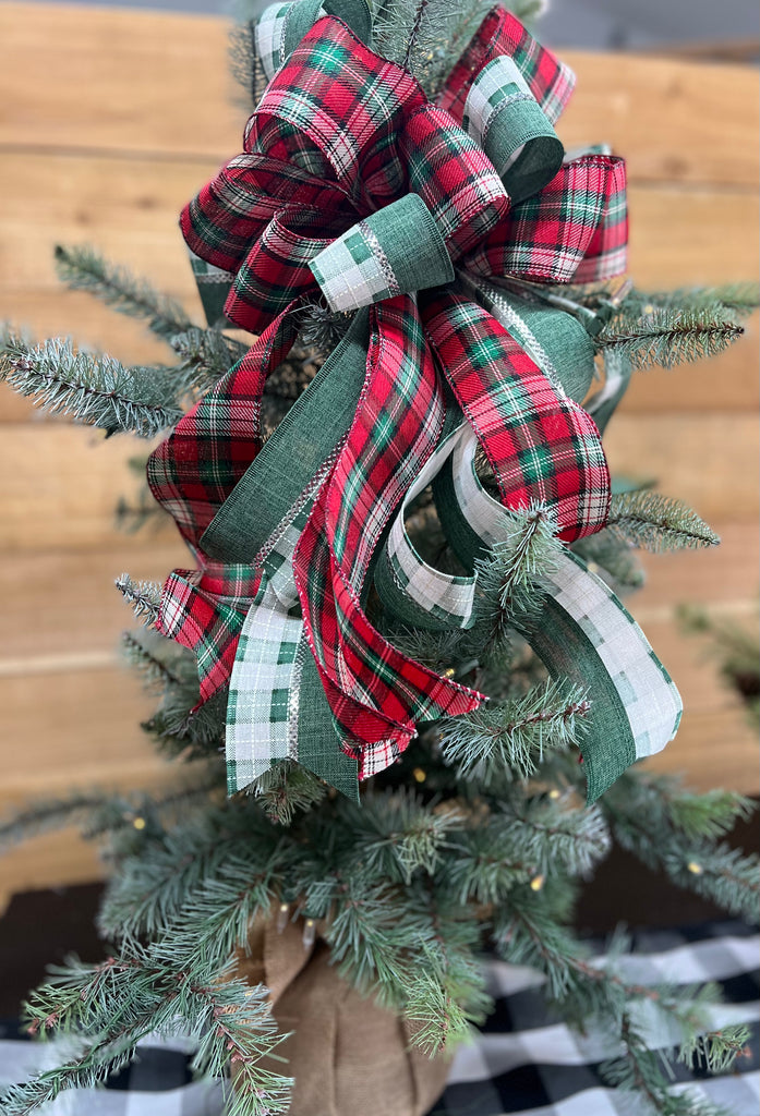 Christmas tree ribbon topper deals